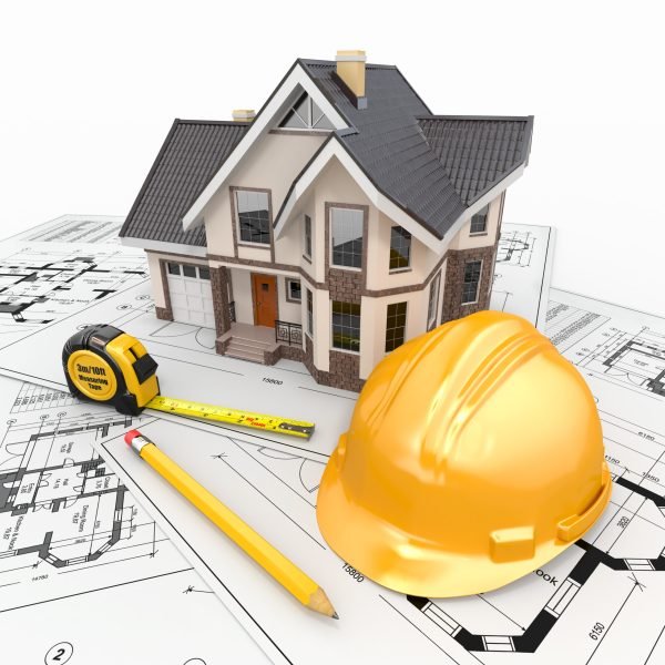 Residential house with tools on architect blueprints. Housing project. 3d